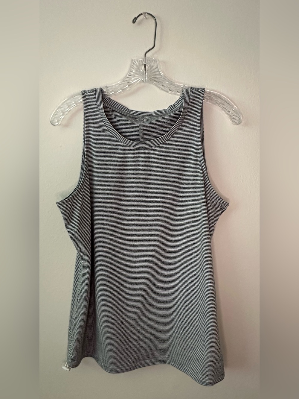 We Wander/ We Flex polyester/spandex top for workout or casual sleeveless Medium